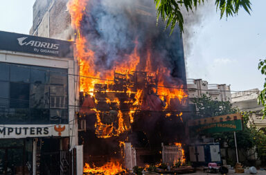 In connection with the coaching centre fire tragedy, four owners have been arrested and four officials suspended as authorities intensify action over alleged safety lapses and negligence.