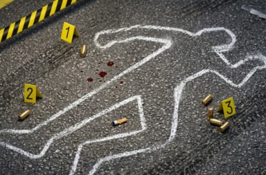 A brutal murder has shocked the state capital, where a young man was allegedly beaten to death in front of his father and sister. Police have launched an investigation into the incident.