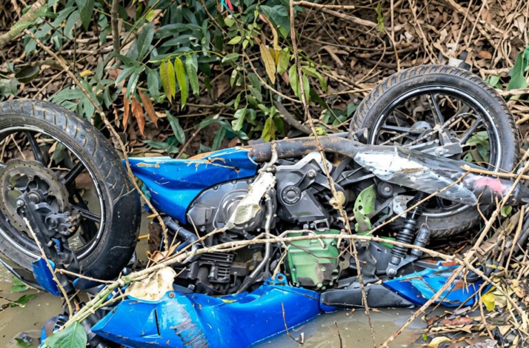 Bike falls off a bridge in a tragic accident, leaving two people dead. 🏍️🌉💥🕯️⚠️