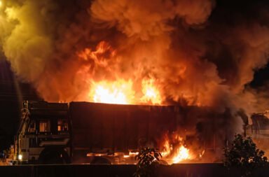 A 12-wheeler truck was completely gutted after catching fire, causing extensive damage. Fortunately, no casualties have been reported.