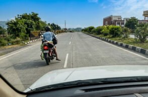 A man was forced to carry his wife's body on a motorcycle, triggering public outrage and raising serious questions over the adequacy of government healthcare and emergency transport facilities.