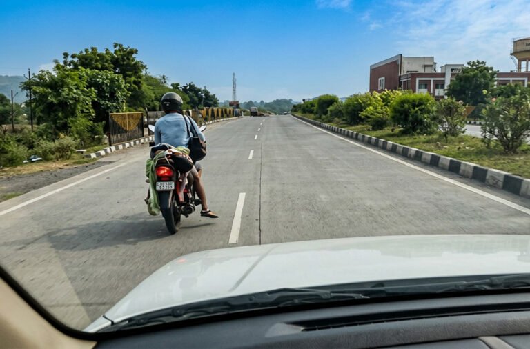 A man was forced to carry his wife's body on a motorcycle, triggering public outrage and raising serious questions over the adequacy of government healthcare and emergency transport facilities.