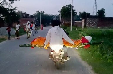 The dead body was carried for 10 km on a motorcycle.