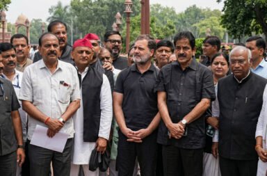 **Uproar continues for the fourth day in Parliament. Opposition parties are not allowing the House to function. Both the ruling party and the opposition staged protests outside Parliament, with demonstrations intensifying near the Makar Dwar. Ruling party MPs protested against Rahul Gandhi’s sit-in, while Parliamentary Affairs Minister Kiren Rijiju said a solution would be sought through dialogue with the opposition.**