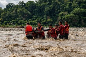 Two women were stranded in a swollen river and were safely rescued by the Fire and Emergency Services after a swift rescue operation.