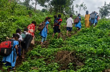 No school to study, no proper road to get there; children travel 8 km through dense forests for education.