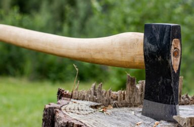 Woman hacked to death with an axe by her husband.